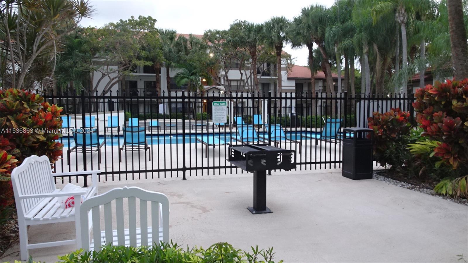 650 South Park Road, Unit 135 Hollywood, FL 33021 - Photo 34 of 36 a view of a house with iron fence