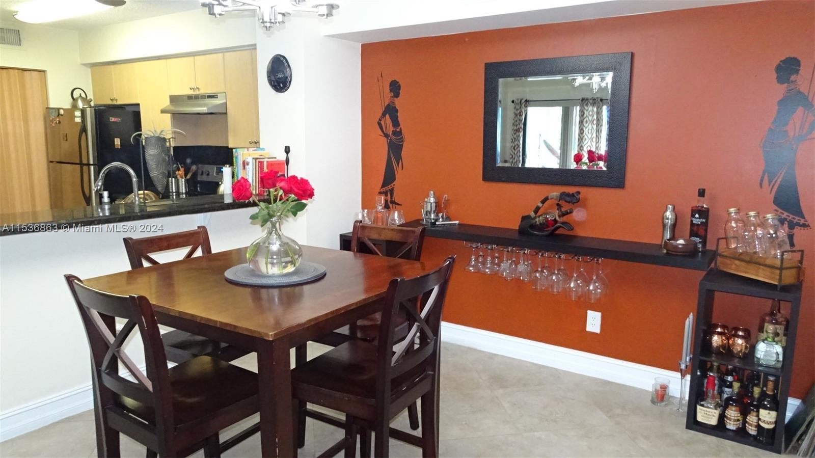 650 South Park Road, Unit 135 Hollywood, FL 33021 - Photo 4 of 36 a view of a dining room with furniture and chandelier