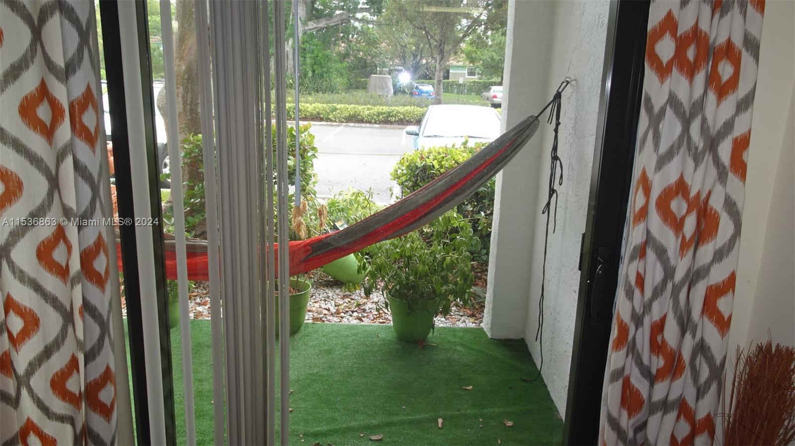 650 South Park Road, Unit 135 Hollywood, FL 33021 - Photo 8 of 36 a view of a door and a yard from a window