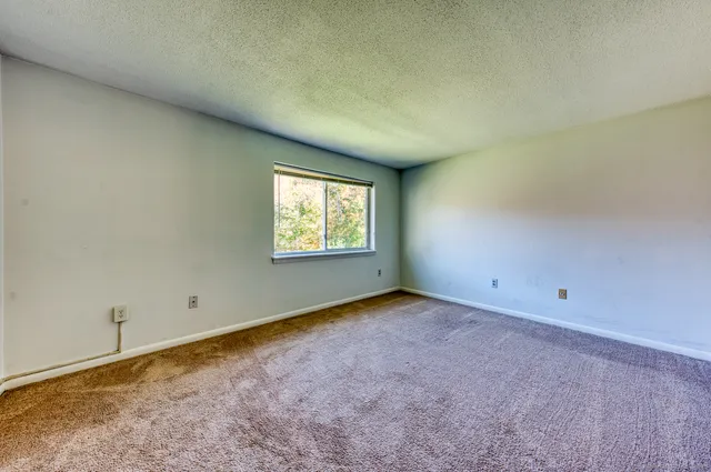 a view of a room with a hallway
