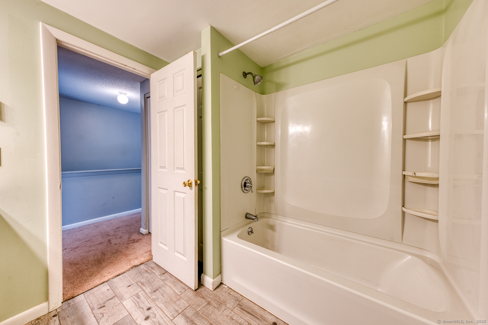 12 Stone Pond Road, Unit 12 Tolland, CT 06084 - Photo 20 of 31 a bathroom with a bathtub and a shower