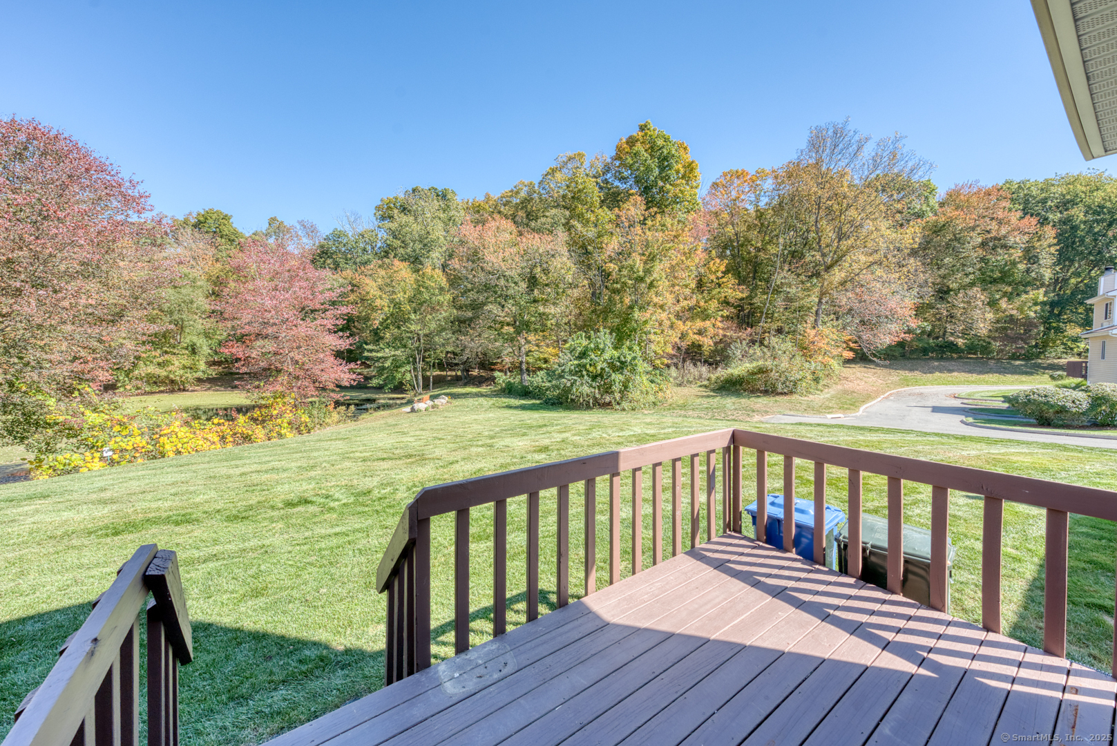 12 Stone Pond Road, Unit 12 Tolland, CT 06084 - Photo 28 of 31 a view of deck and deck with wooden floor and fence