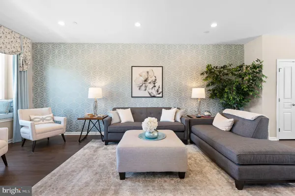 a living room with furniture and a couch