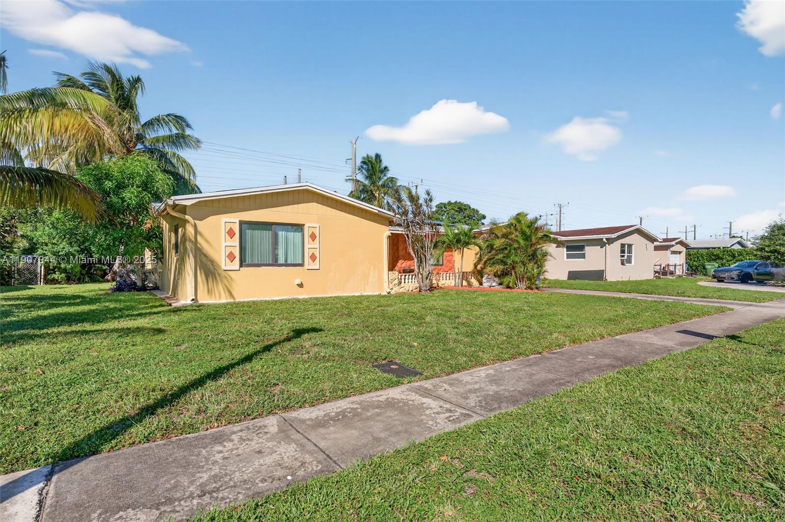 849 Northwest 70th Way Margate, FL 33063 - Photo 2 of 29 a view of a house with a backyard