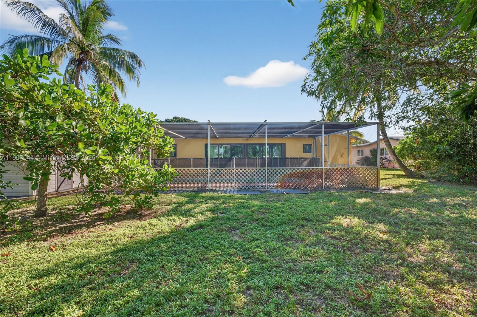 849 Northwest 70th Way Margate, FL 33063 - Photo 27 of 29 a view of backyard with green space