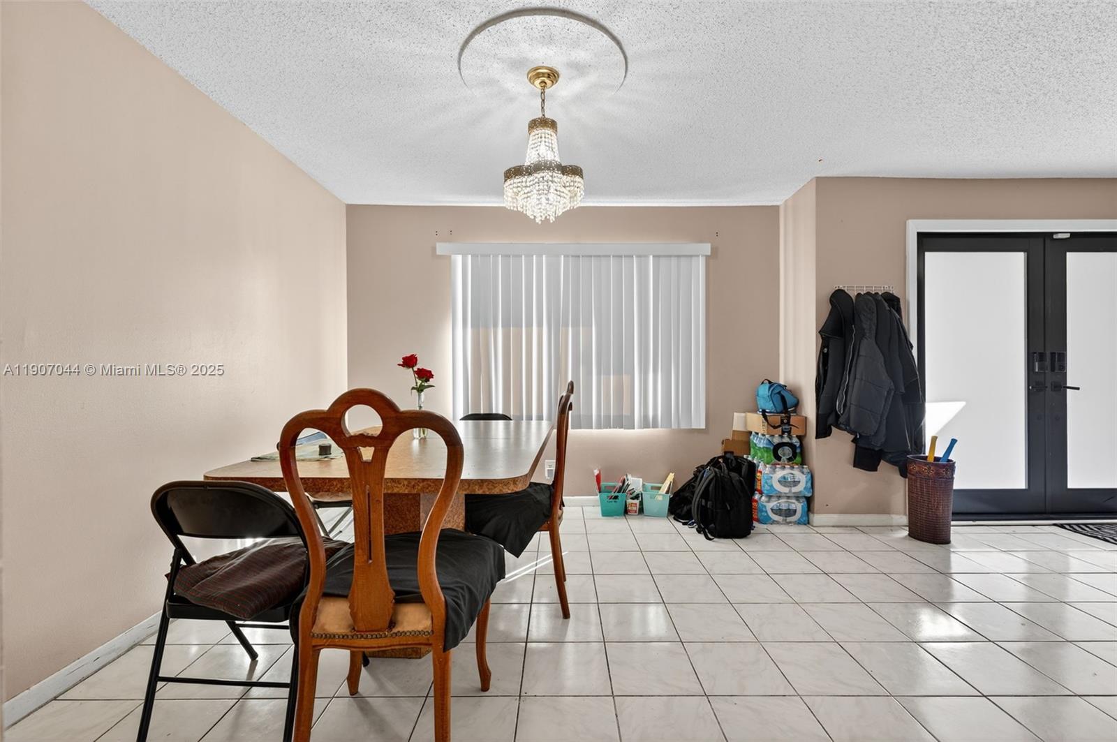 849 Northwest 70th Way Margate, FL 33063 - Photo 9 of 29 a dining room with furniture and windows