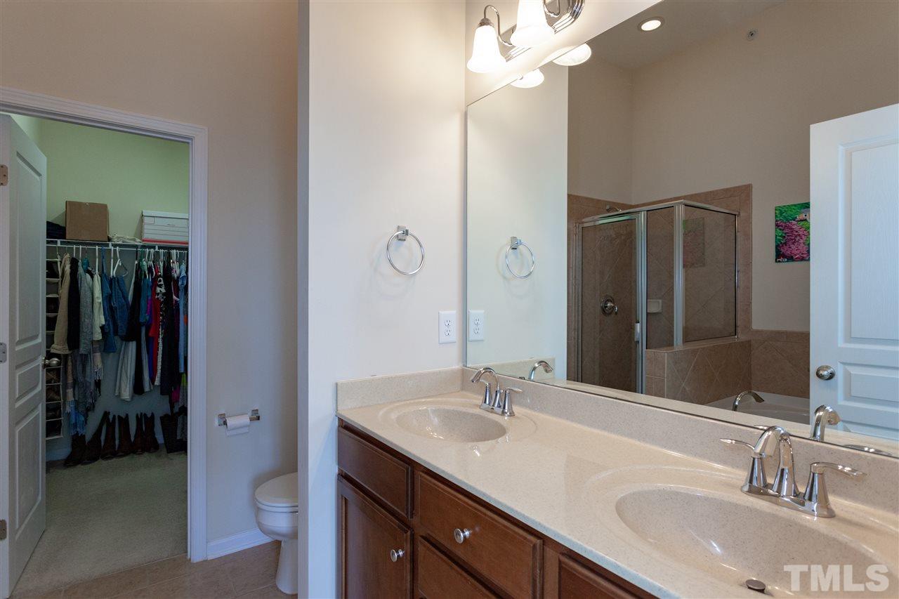 9153 Wooden Road Raleigh, NC 27617 - Photo 15 of 25 Huge Walk in Closet off the Master Bath
