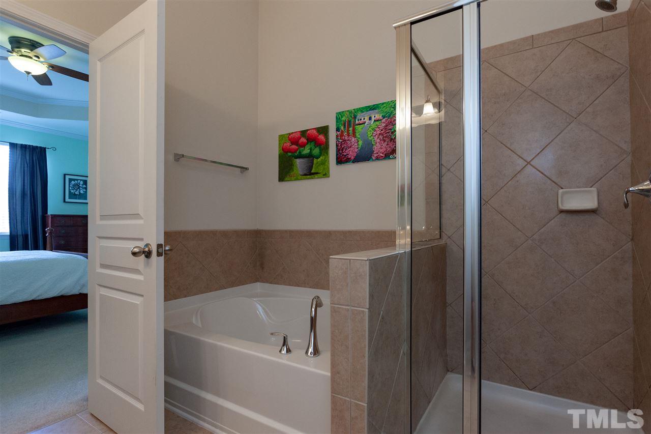 9153 Wooden Road Raleigh, NC 27617 - Photo 16 of 25 Spa tub w/ separate shower.