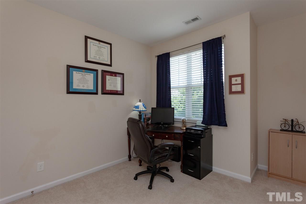 9153 Wooden Road Raleigh, NC 27617 - Photo 18 of 25 Bedroom or home office space.