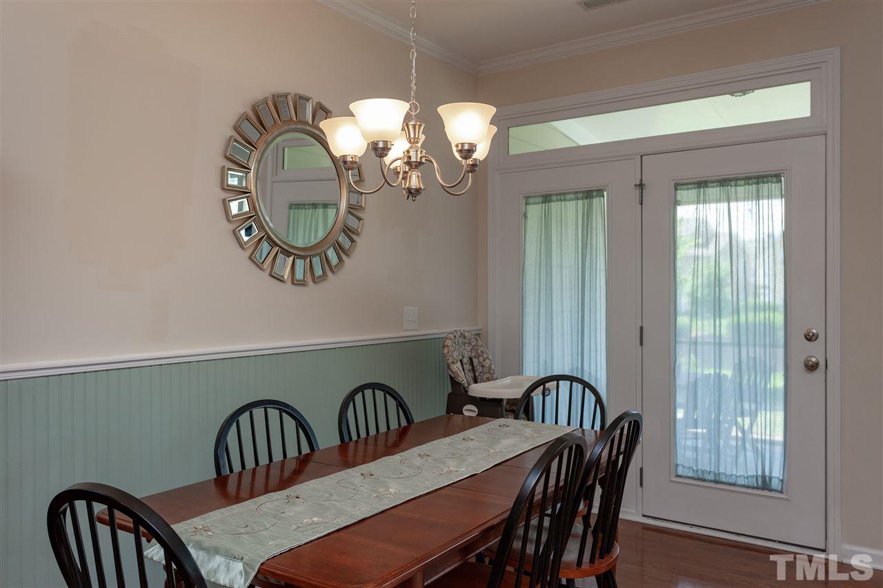 9153 Wooden Road Raleigh, NC 27617 - Photo 3 of 25 Nice bright dining room.