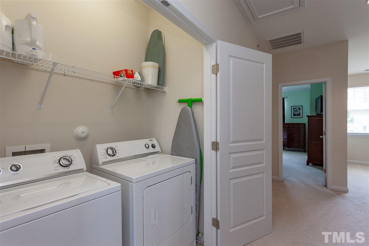 9153 Wooden Road Raleigh, NC 27617 - Photo 21 of 25 2nd floor laundry.