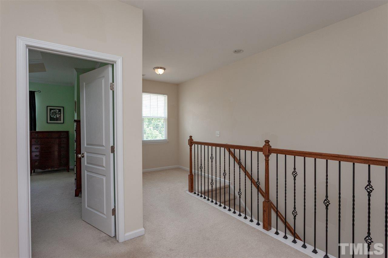 9153 Wooden Road Raleigh, NC 27617 - Photo 22 of 25 Open and bright upstairs landing