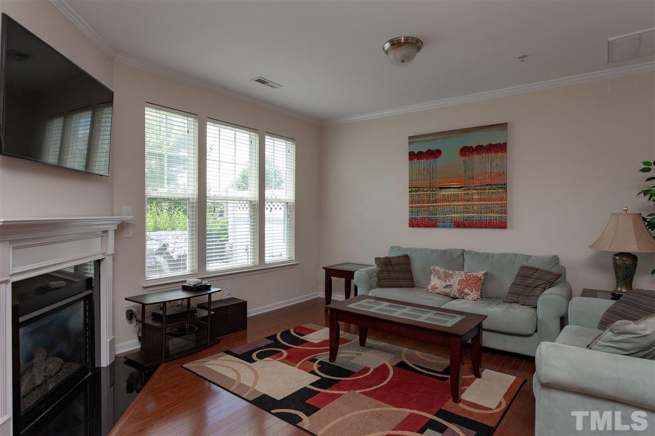 9153 Wooden Road Raleigh, NC 27617 - Photo 8 of 25 Bright and open family room.