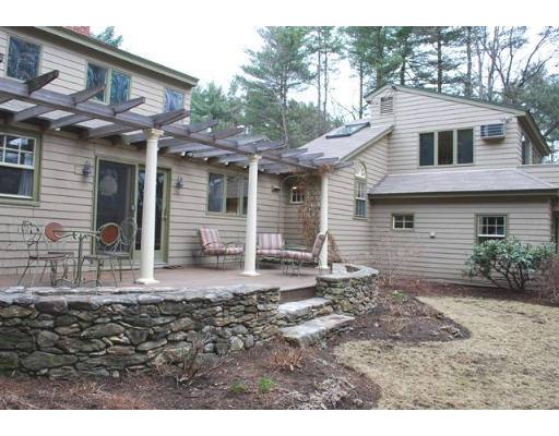 247 Nashoba Road Concord, MA 01742 - Photo 23 of 23 a front view of a house with garden