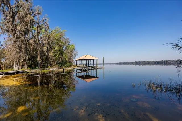 a view of house with lake view