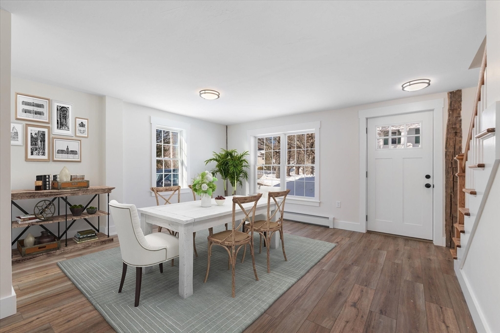 67 Maple Street Oakham, MA 01068 - Photo 18 of 42 a view of a dining room with furniture and wooden floor