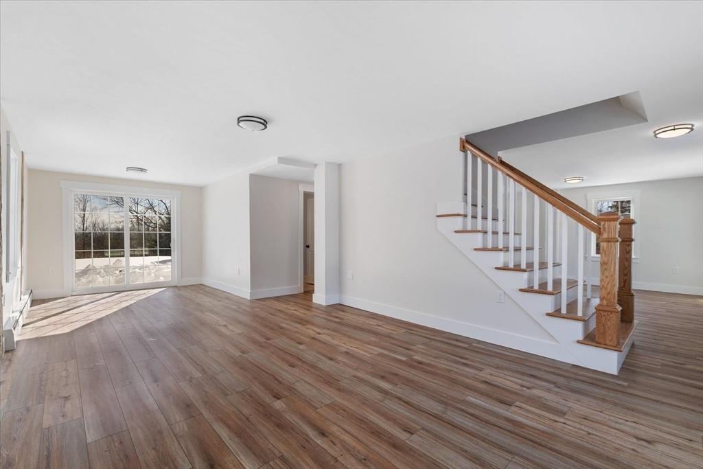 67 Maple Street Oakham, MA 01068 - Photo 19 of 42 a view of an entryway with wooden floor