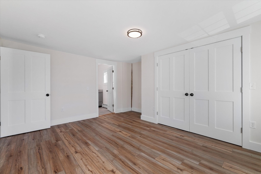 67 Maple Street Oakham, MA 01068 - Photo 27 of 41 a view of a livingroom with wooden floor