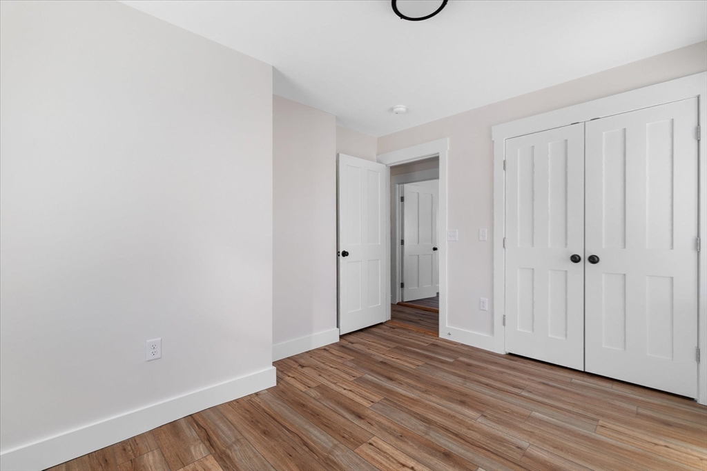 67 Maple Street Oakham, MA 01068 - Photo 33 of 42 a view of a livingroom with wooden floor