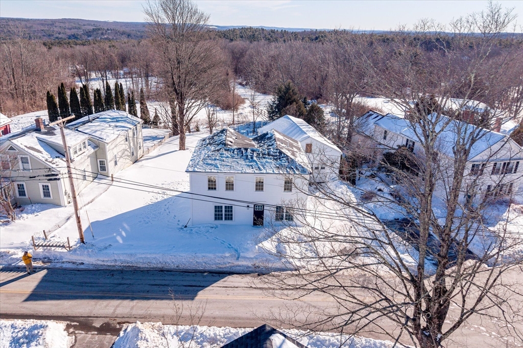 67 Maple Street Oakham, MA 01068 - Photo 5 of 41 a view of a house with a yard