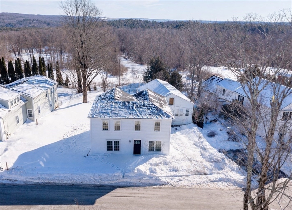 67 Maple Street Oakham, MA 01068 - Photo 6 of 42 a view of a house with a yard