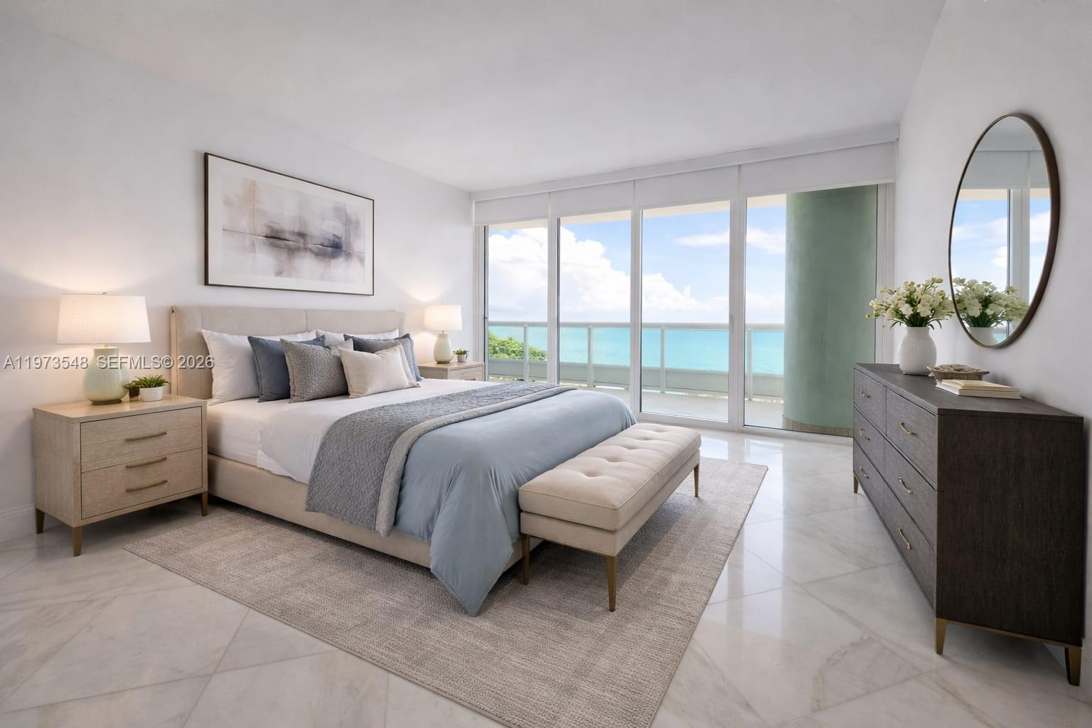 1643 Brickell Avenue, Unit 903 Miami, FL 33129 - Photo 18 of 18 a spacious bedroom with a bed and a large window