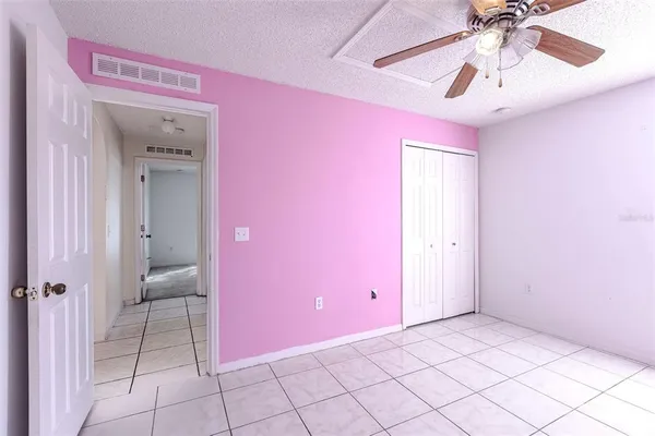 a kitchen with stainless steel appliances granite countertop a refrigerator a stove and a sink