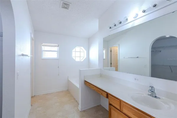 a bathroom with a shower and a toilet