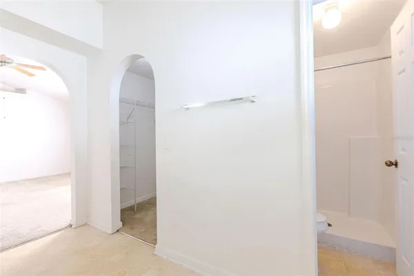 a view of an empty room and window