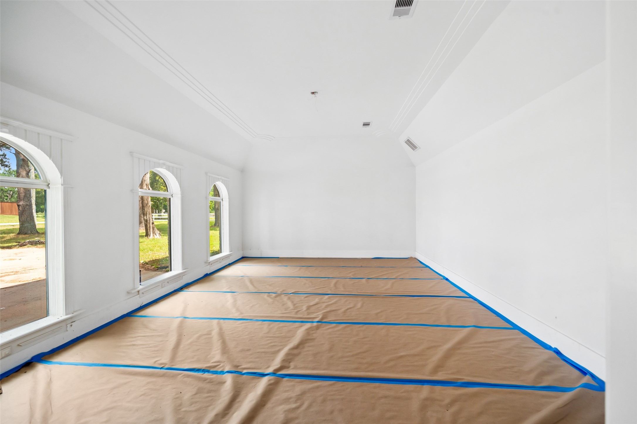 21310 Rosehill Church Road Tomball, TX 77377 - Photo 13 of 37 a view of an empty room with window and wooden floor