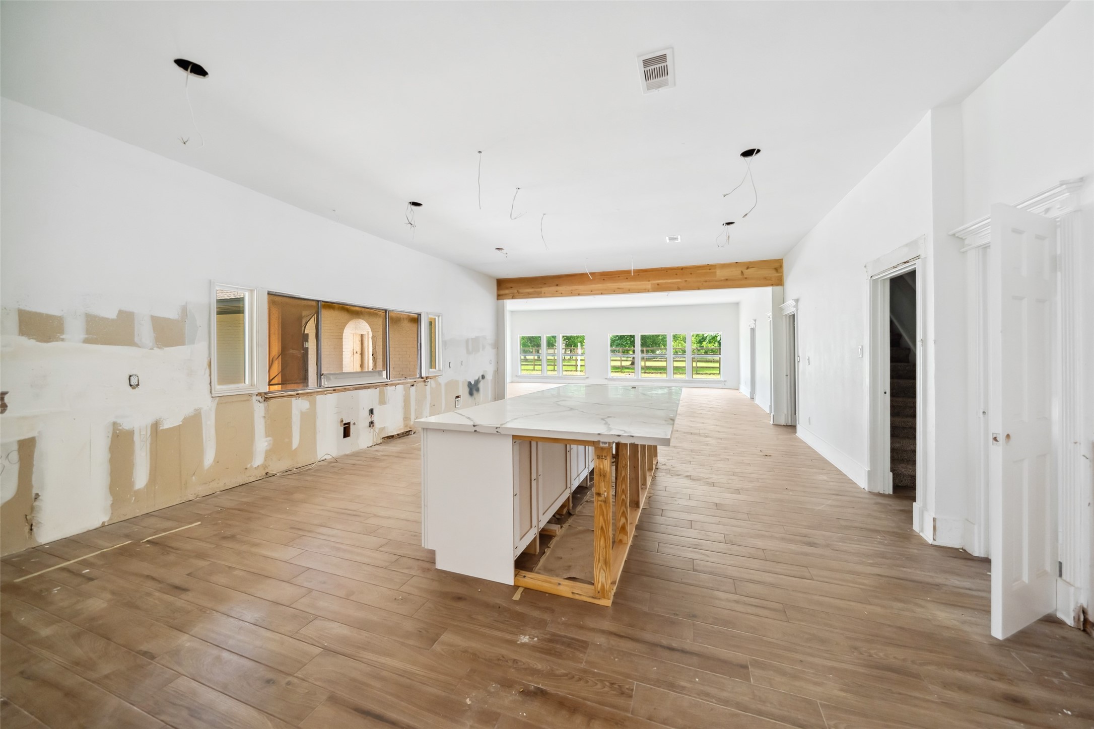 21310 Rosehill Church Road Tomball, TX 77377 - Photo 15 of 37 a living room with furniture and a wooden floor