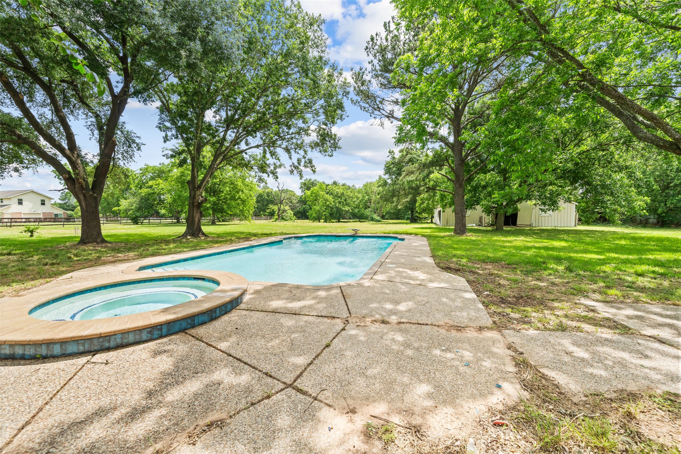 21310 Rosehill Church Road Tomball, TX 77377 - Photo 24 of 37 a view of a swimming pool with a yard