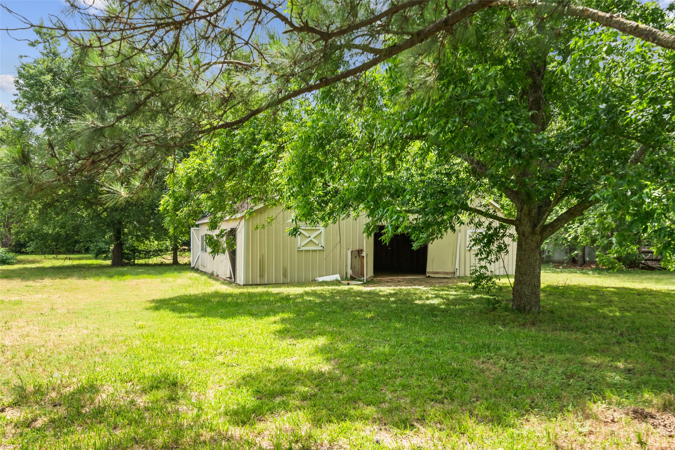21310 Rosehill Church Road Tomball, TX 77377 - Photo 25 of 37 a view of a house with a yard
