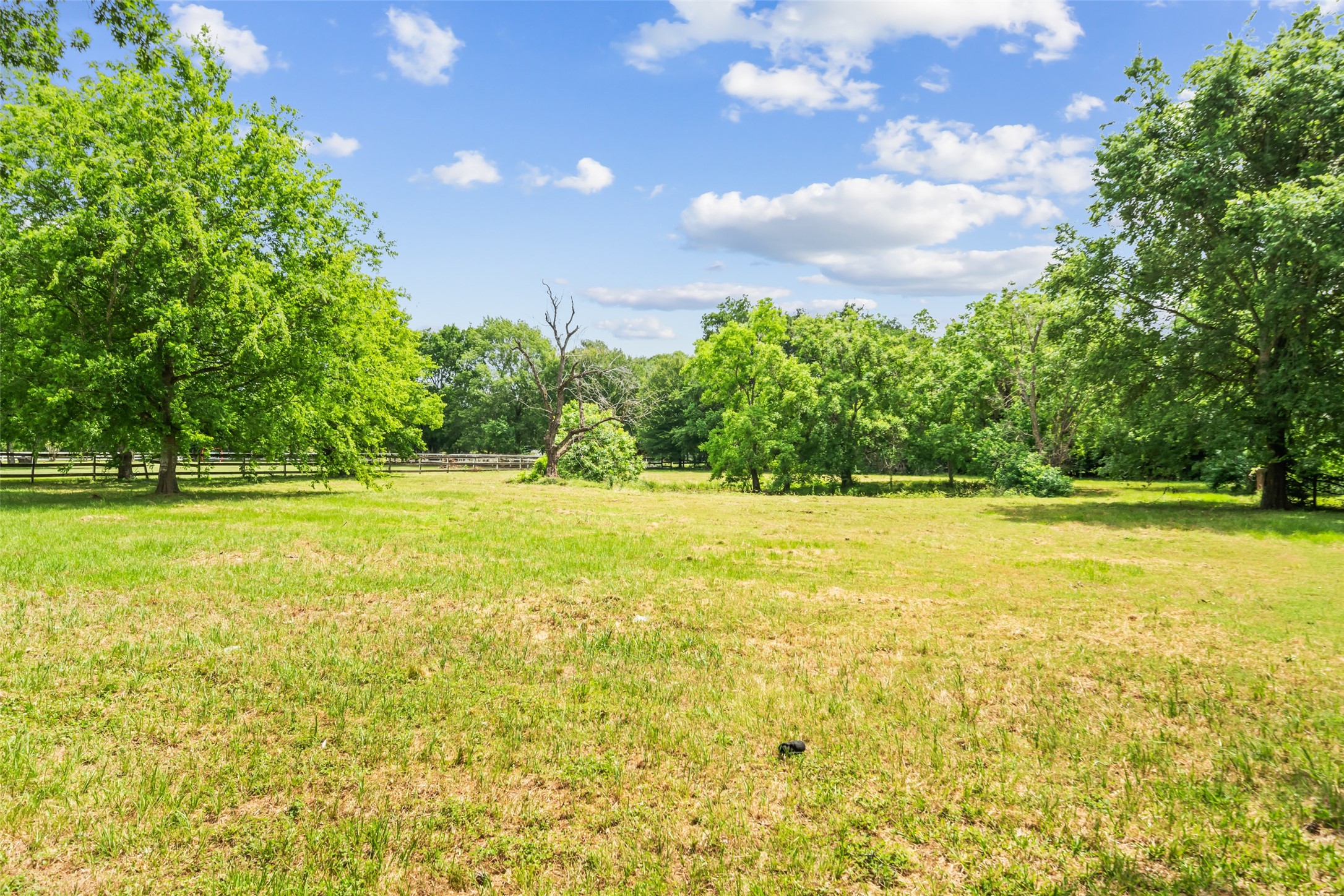 21310 Rosehill Church Road Tomball, TX 77377 - Photo 26 of 37 a view of a swimming pool with an outdoor space and seating area