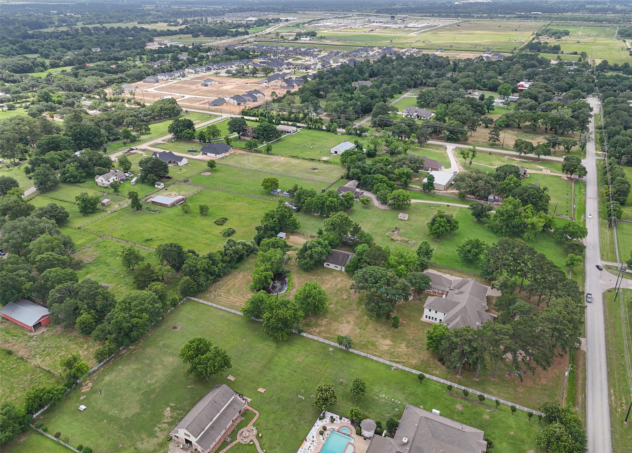21310 Rosehill Church Road Tomball, TX 77377 - Photo 3 of 37 a view of a lake with a city