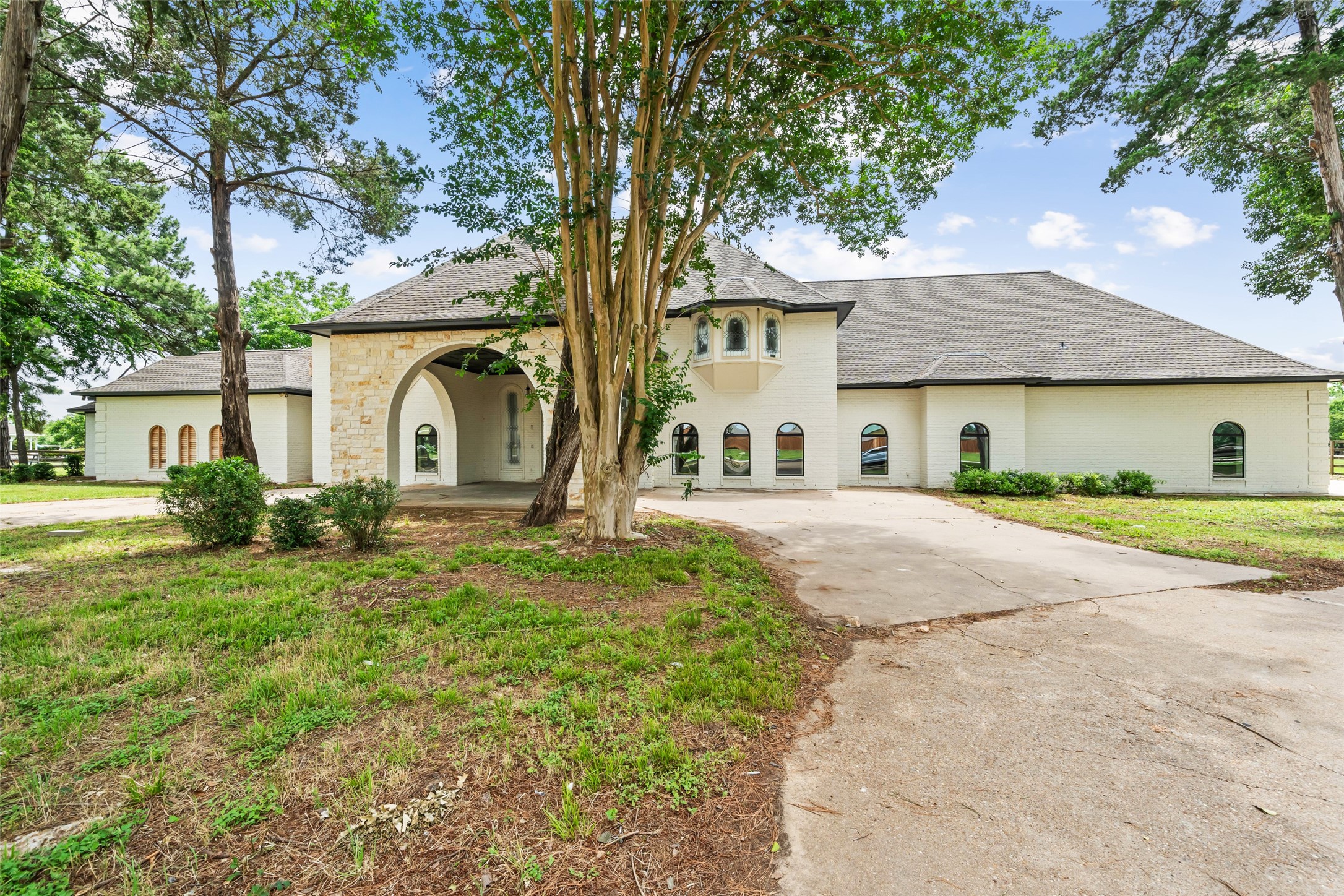 21310 Rosehill Church Road Tomball, TX 77377 - Photo 8 of 37 a front view of a house with a garden