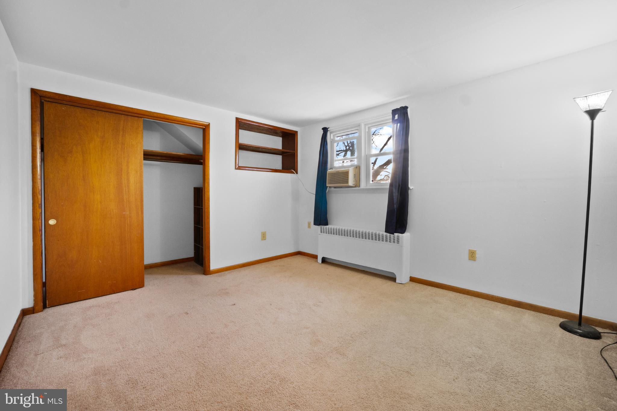 842 Bethlehem Pike, Unit B Colmar, PA 18915 - Photo 12 of 13 a view of an empty room with a window