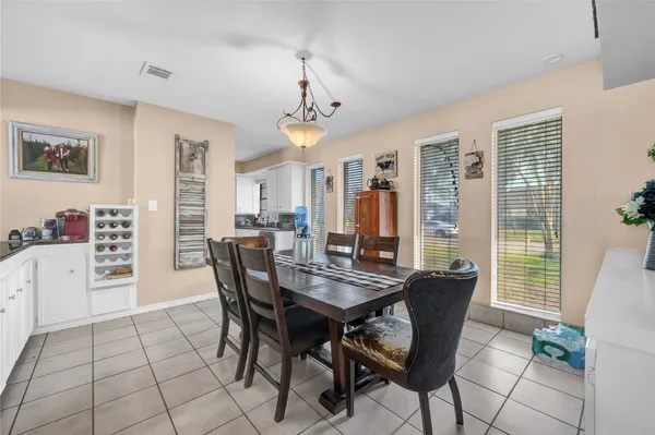 a view of a dining room with furniture
