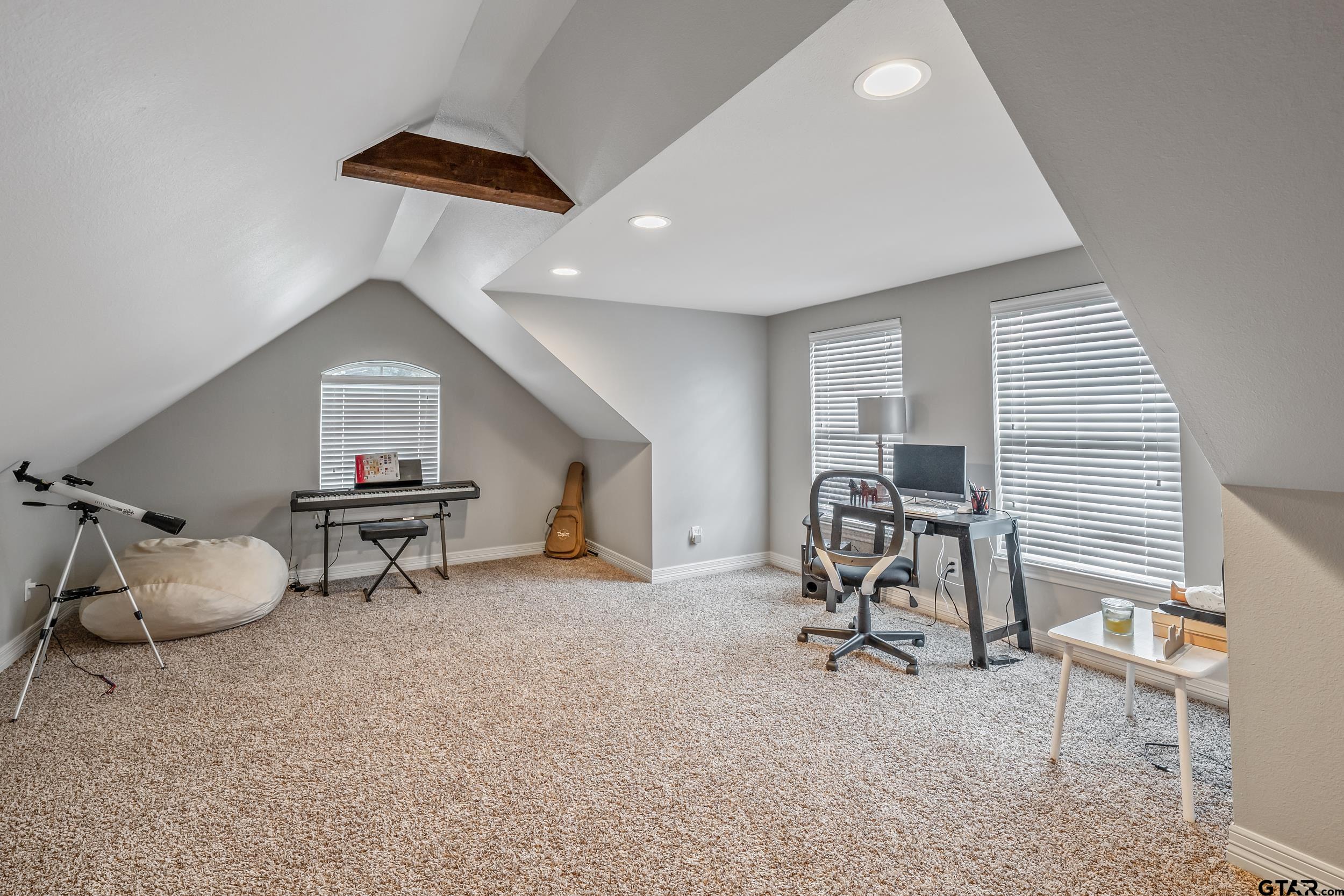 11775 Belle Chase Tyler, TX 75703 - Photo 22 of 28 a view of a workspace with furniture and a window