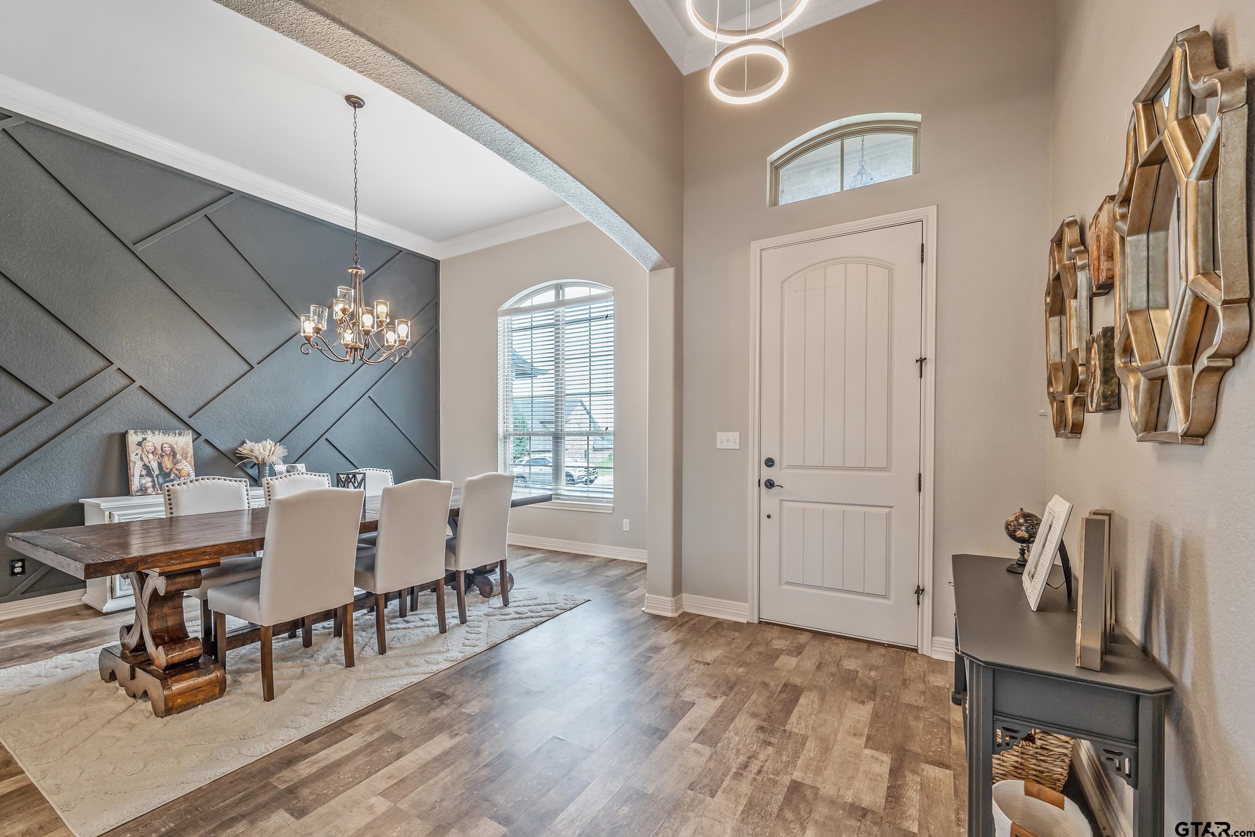 11775 Belle Chase Tyler, TX 75703 - Photo 4 of 28 a view of a livingroom with furniture window and wooden floor