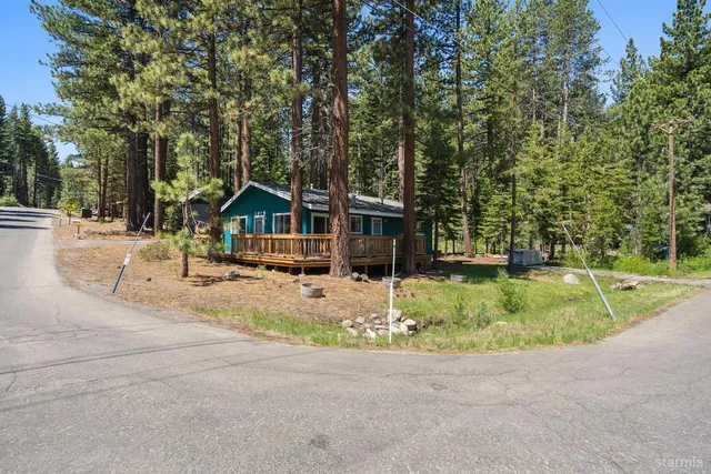 a house with trees in the background