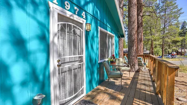 a view of a balcony with chairs