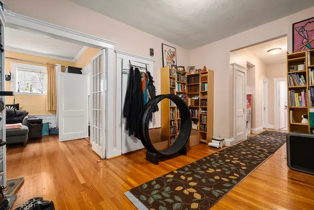 a view of a dining room with furniture and window