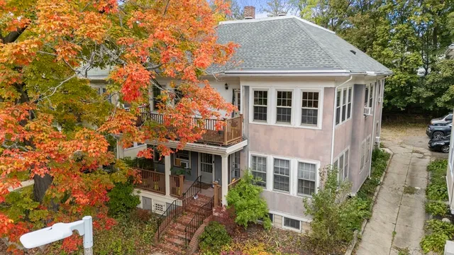 an aerial view of residential house with outdoor space