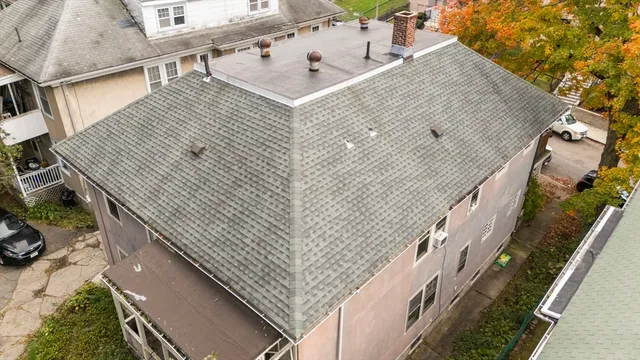 an aerial view of a city with lots of residential buildings
