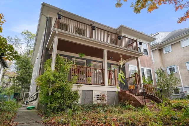 front view of a house with a small yard
