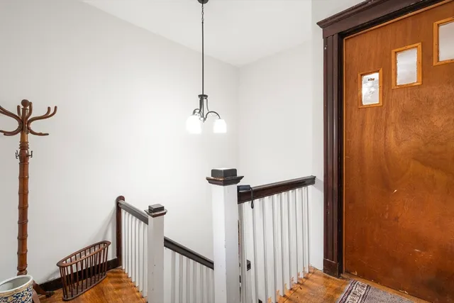a view of a hallway with a window