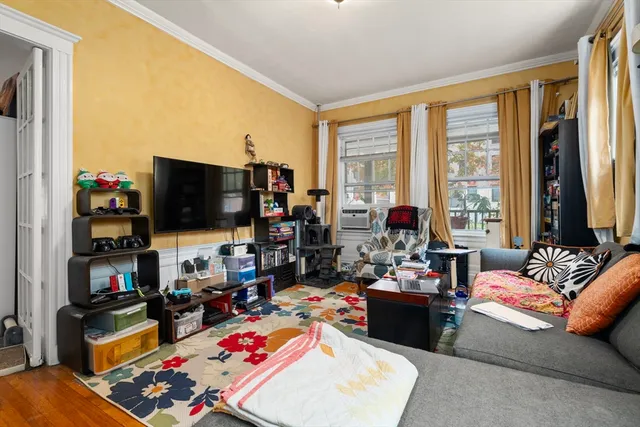 a view of a hallway with washer and dryer