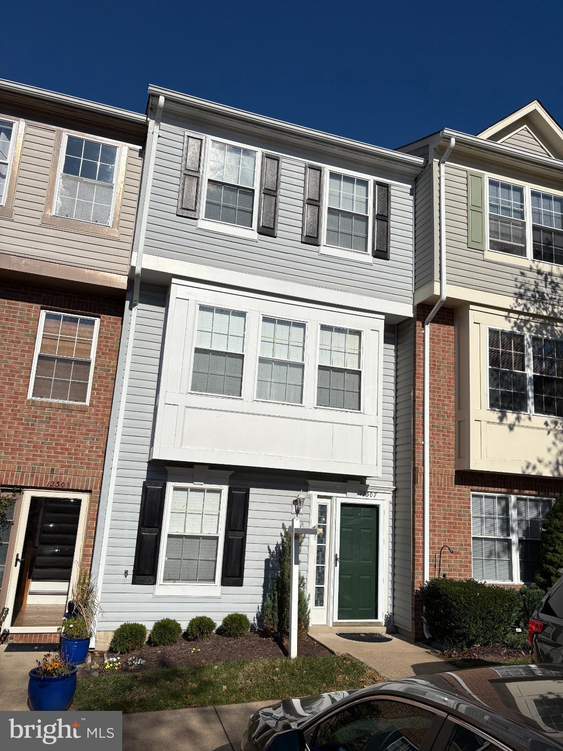 a front view of a building with balcony