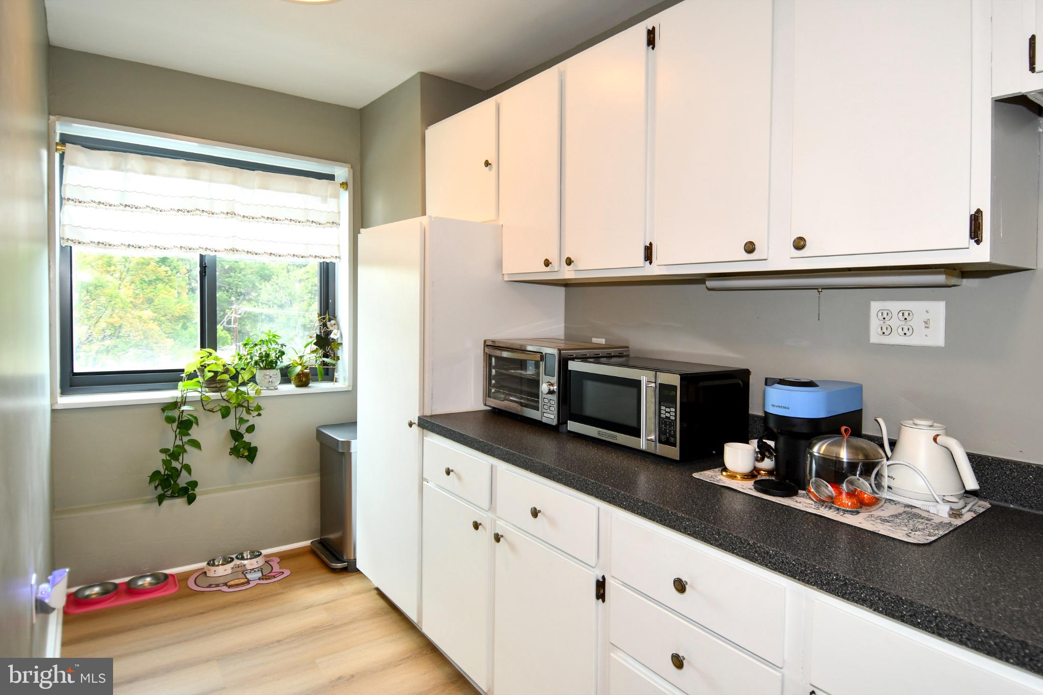 1300 South Arlington Ridge Road, Unit 204 Arlington, VA 22202 - Photo 14 of 49 Bright and inviting kitchen space.